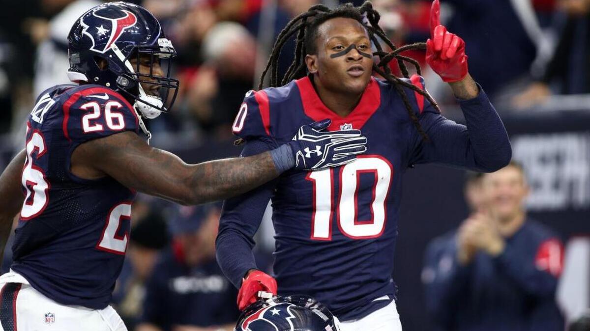 Houston Texans wide receiver DeAndre Hopkins (10) celebrates after scoring a touchdown during the second quarter of the AFC Wild Card playoff football game against the Oakland Raiders at NRG Stadium.