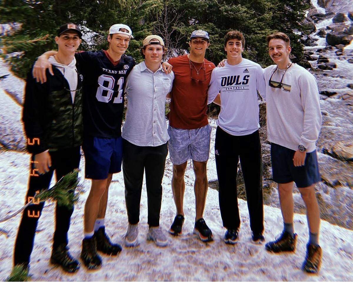 Former Westlake High School footballteammates Cade Klubnik (red shirt) and Christian Edgar (white Owls shirt) during a group trip to Jackson Hole, Wyoming