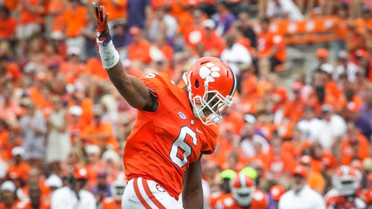 Clemson linebacker Dorian O'Daniel (6) takes a bow after making a tackle against Troy.