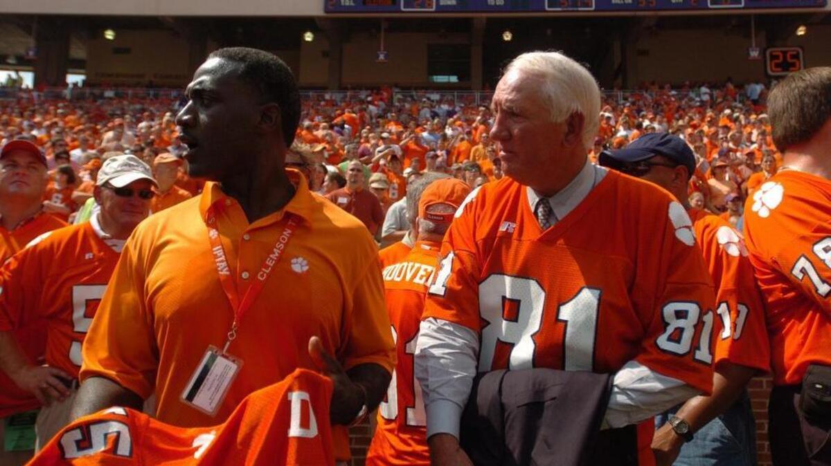 Jeff Davis, left, and Danny Ford talk before they and the rest of the 1981 Clemson team were honored at halftime of a 2006 game at Memorial Stadium in Clemson.
