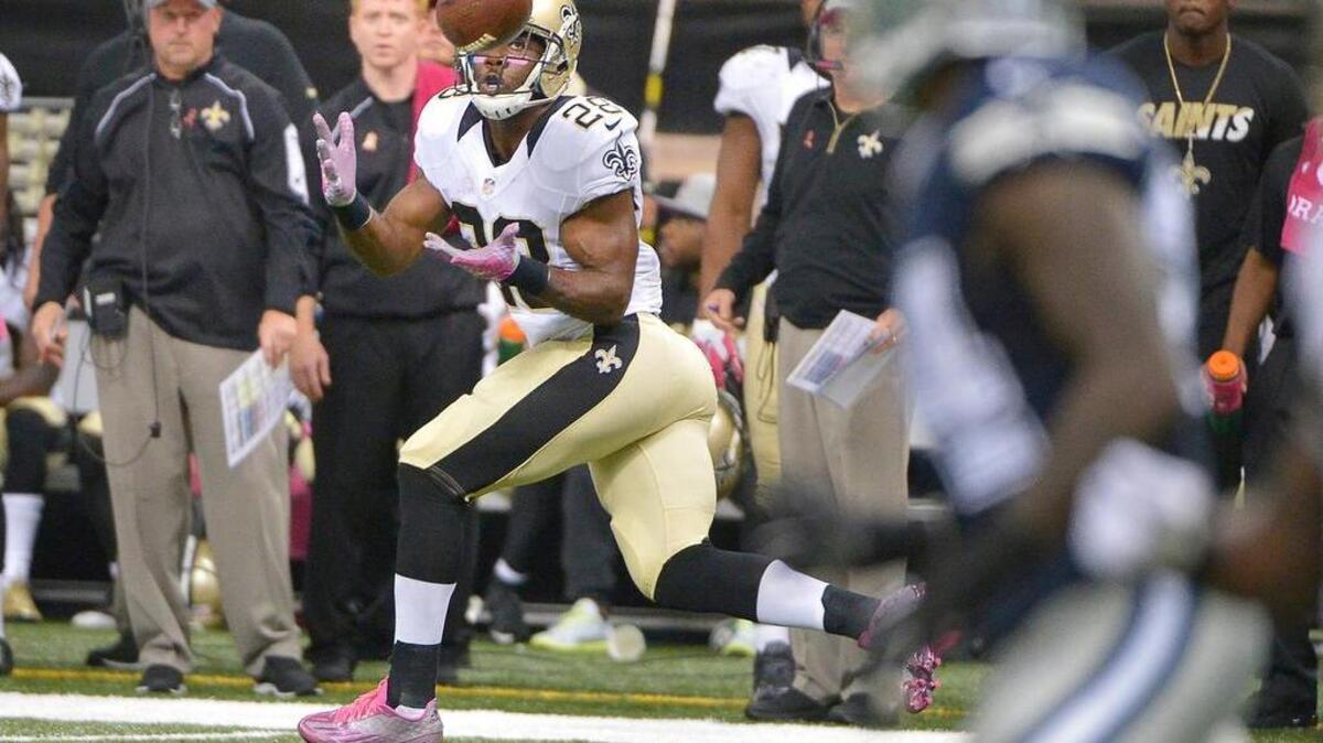 
New Orleans running back C.J. Spiller makes an 80-yard catch and run for the winning touchdown to beat Dallas 26-20 in overtime Sunday.
