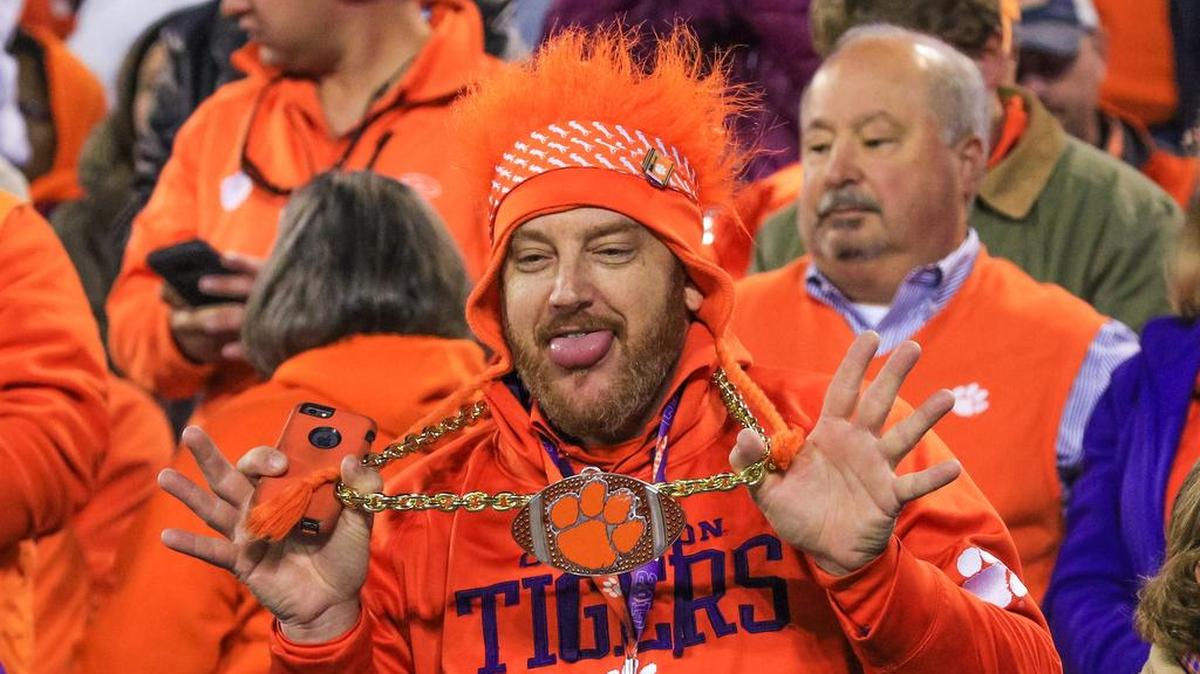 Clemson fan Shane Moore of Greenville shows of his chain during of the first half of the ACC Championship game.