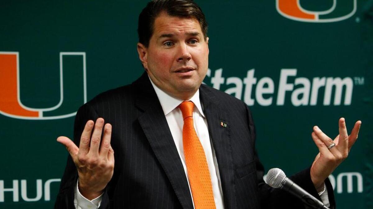 Miami head football coach Al Golden gestures as he speaks during a news conference in Coral Gables, Fla. Miami has fired Golden, midway through his fifth season and one day after the Hurricanes endured the worst loss in the program's 90-year history.