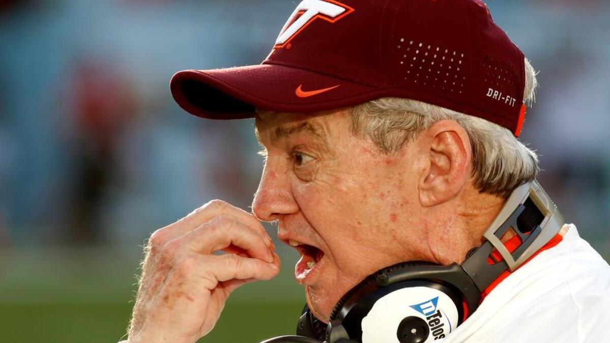 Virginia Tech head coach Frank Beamer argues a call with an official in the second half of play against Miami in an NCAA college football game, Saturday, Oct. 17, 2015, in Miami Gardens, Fla. Miami won the game 30-20.