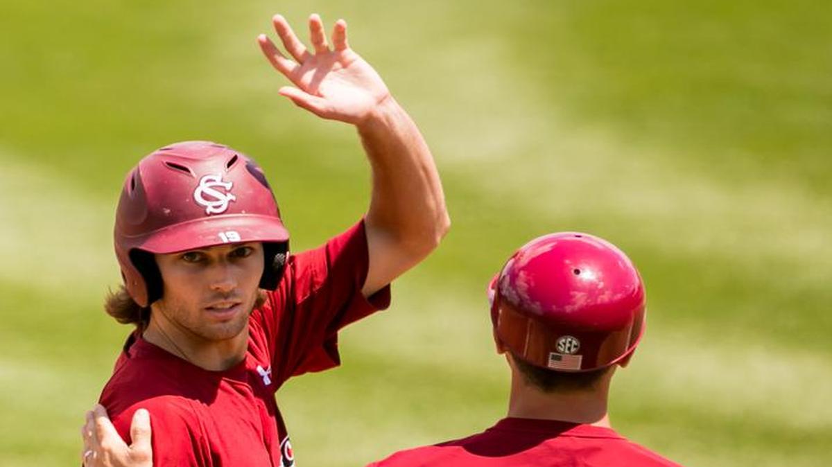 South Carolina right fielder Gene Cone (19) acknowledges the cheers of the crowd after leading off the game against the Missouri Tigers with a triple during the first inning, extending his hitting streak to 27 games.