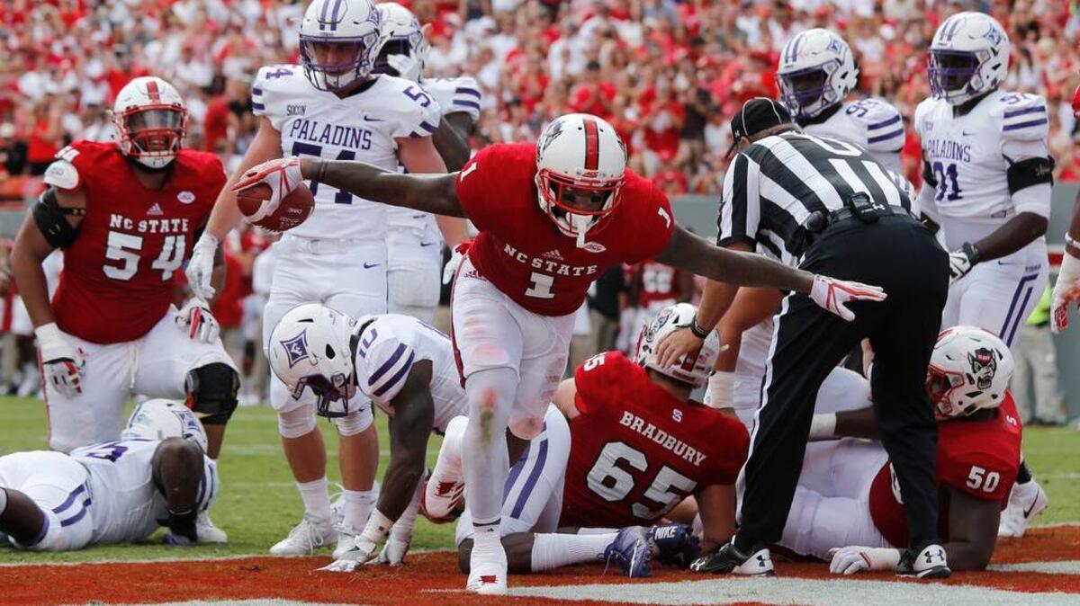 North Carolina State's State's Jaylen Samuels (1) celebrates after scoring on a one-yard touchdown run during the first half of an NCAA college football game against Furman, Saturday, Sept. 16,2017, at Carter-Finley Stadium in Raleigh, N.C.