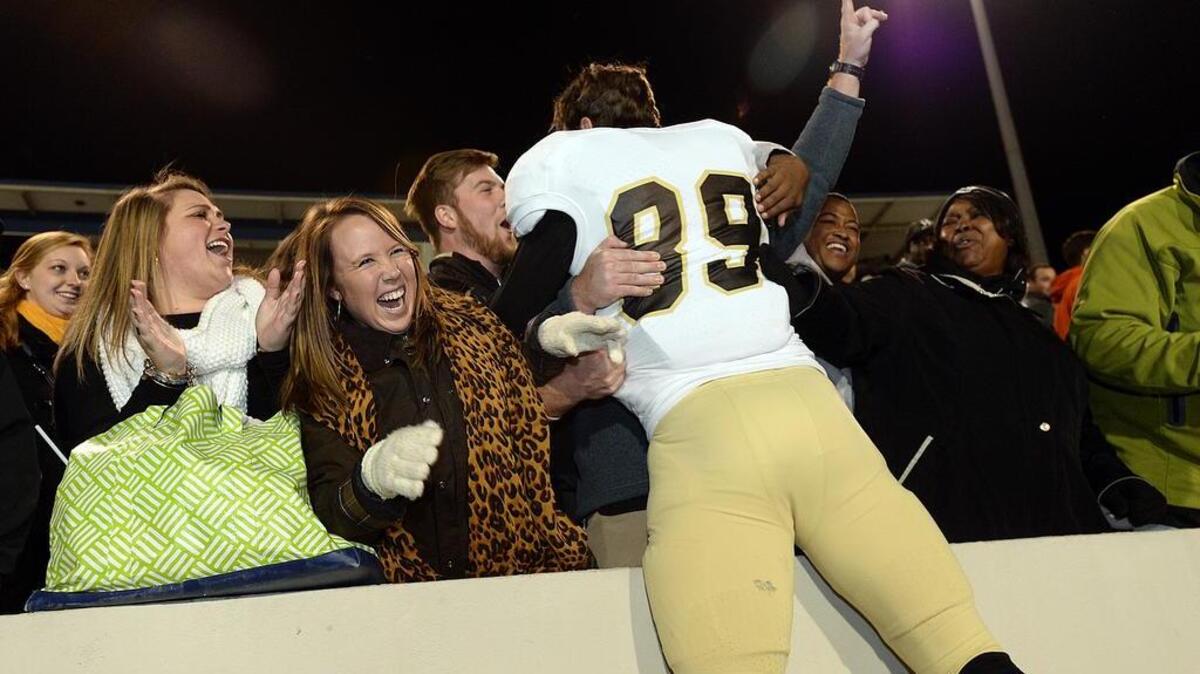 Wofford advanced to the second round of the NCAA Division I Football Championship playoffs to face the number 6 national seed The Citadel. The game was played on Saturday, Dec. 3, 2016 at Johnson Hagood Stadium in Charleston. Wofford's Nick Karas (89) is greeted by fans as the team reacts to the win over The Citadel.
