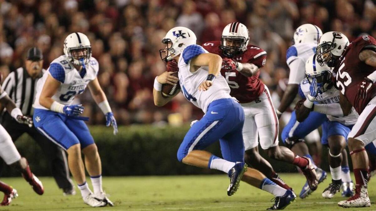 
USC defensive end Darius English tackles quarterback Patrick Towles on Saturday
