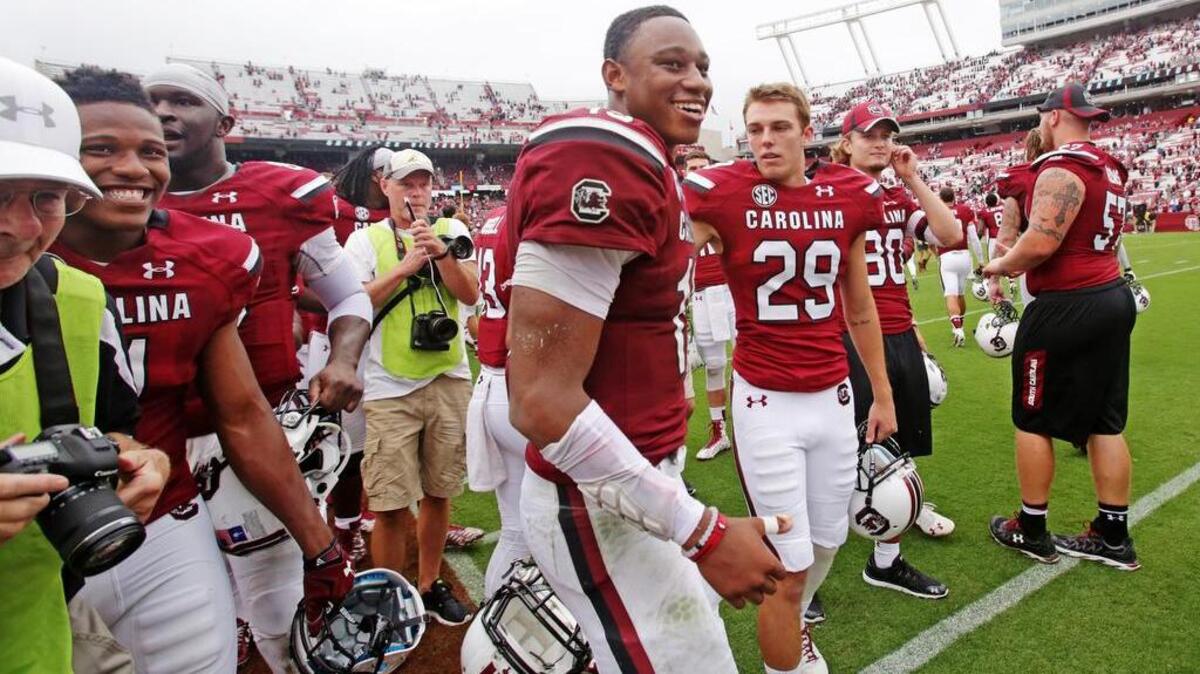 
South Carolina Gamecocks quarterback Lorenzo Nunez (19) is congratulated by wide receiver Pharoh Cooper (11) after their win over UCF.

