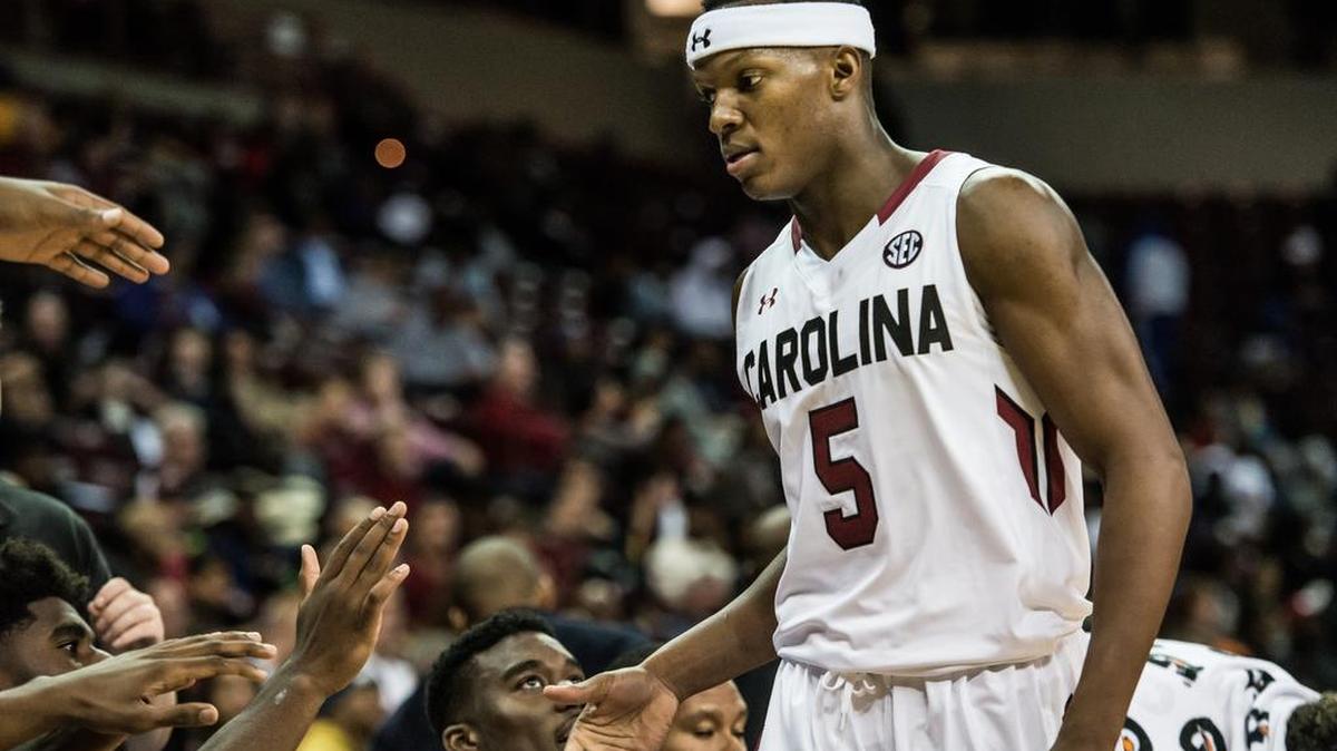 South Carolina redshirt freshman Temarcus Blanton receives support from his teammates against Allen University during exhibition play Sunday afternoon at Colonial Life Arena.