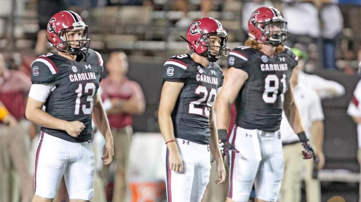 South Carolina's Sean Kelly, Elliott Fry and Hayden Hurst watch Fry's game-winning field goal against Vanderbilt.