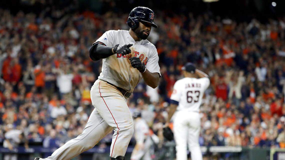 Boston Red Sox’s Jackie Bradley Jr., celebrates after his two-run home run off Houston Astros pitcher Josh James during the sixth inning in Game 4 of a baseball American League Championship Series on Wednesday, Oct. 17, 2018, in Houston.(AP Photo/David J. Phillip)