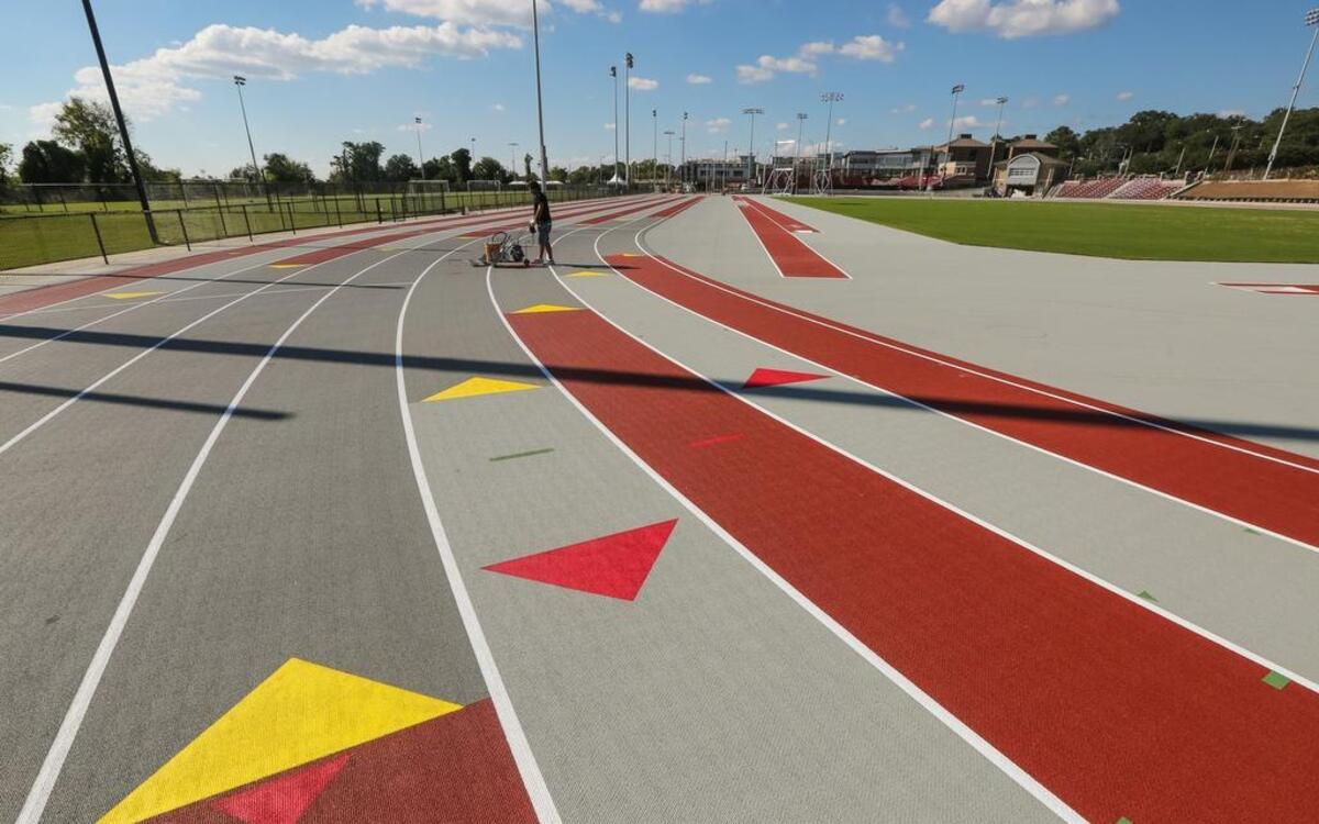 USC's new outdoor track and field oval will seat 1,450 with support building for storage and restrooms.