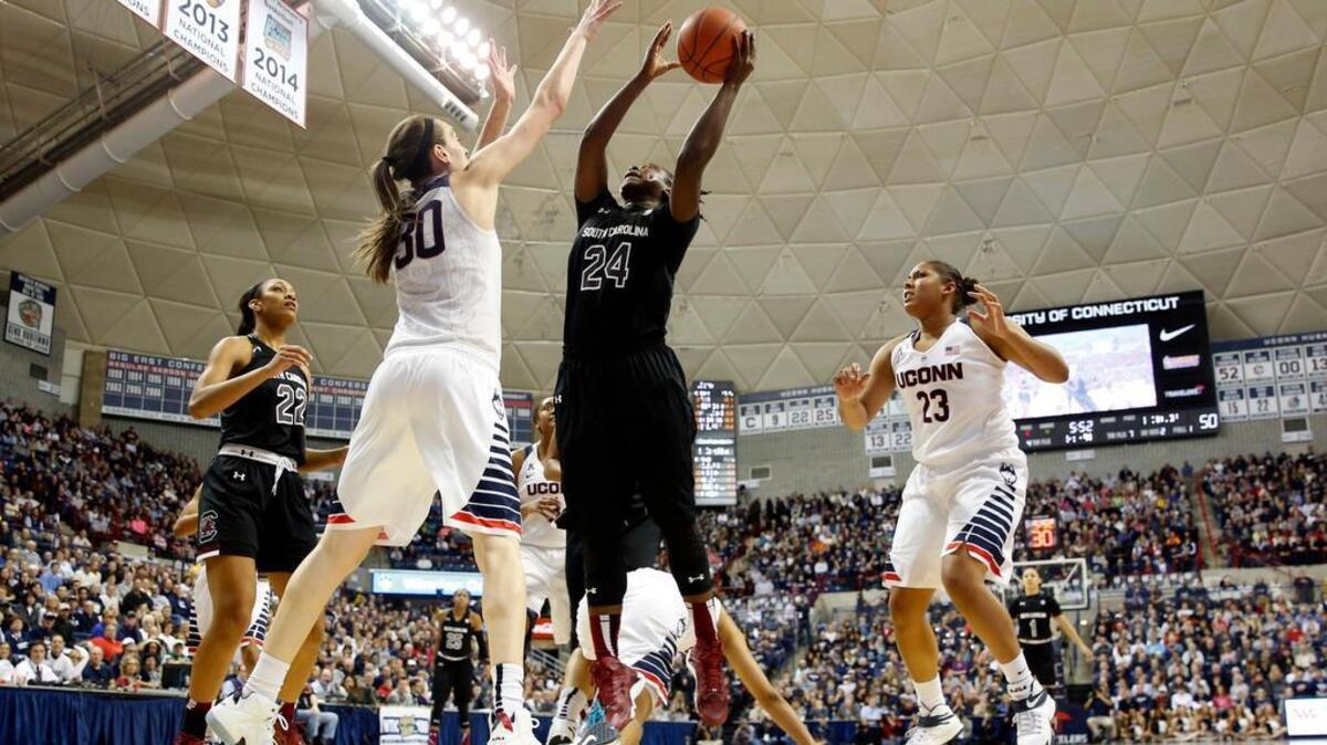 Connecticut Huskies forward Breanna Stewart (30) defends against South Carolina Gamecocks forward Aleighsa Welch (24) last season. The rematch is a key South Carolina sports date to look forward to in the coming year.