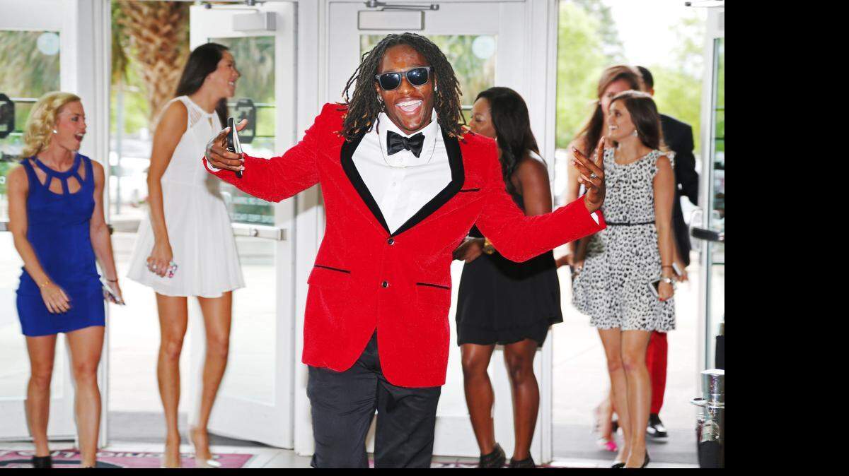 
Greg Chiles, a member of the South Carolina Track and Field team, walks the red carpet as he joins other USC athletes for the 2015 Gamecock Gala at Colonial Life Arena, Monday.
