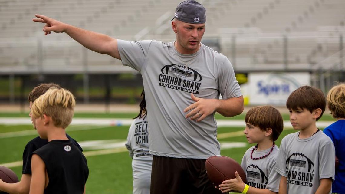 Cleveland Browns quarterback and former South Carolina Gamecock Connor Shaw directs kids during the Connor Shaw ESM Football Camp at Irmo High School.