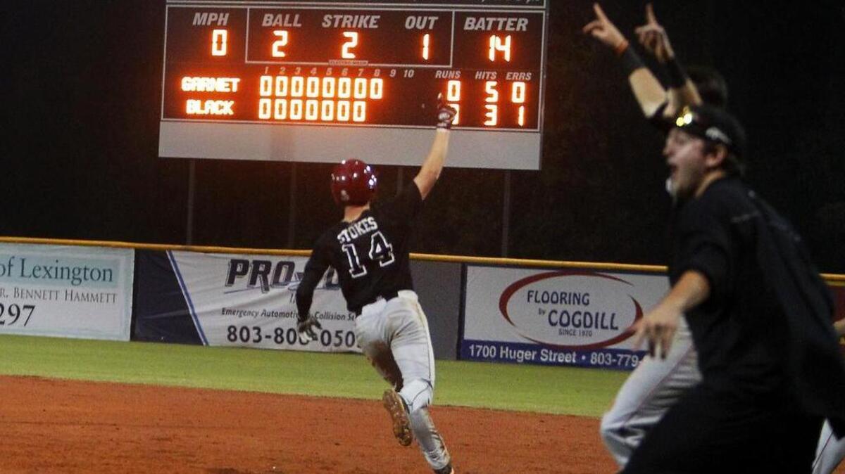 South Carolina's Madison Stokes rounds first after hitting a walk off home run to give his team the win during the Garnet & Black World Series game at Lexington County Baseball Stadium on Thursday.