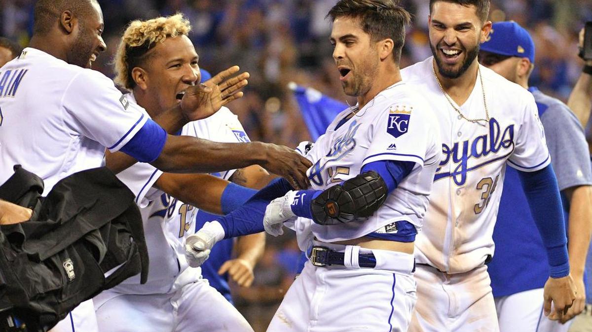 Former Gamecock Whit Merrifield is congratulated by teammates after his walk-off hit Friday night.