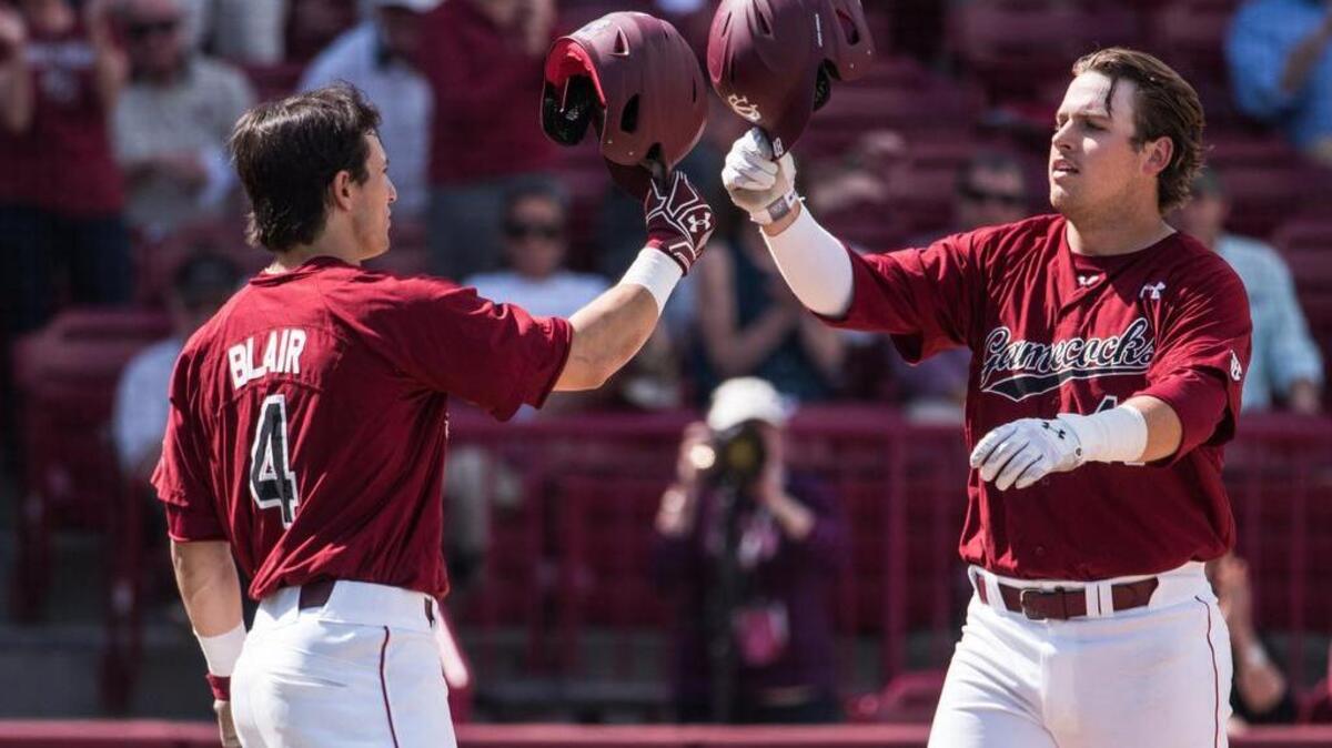 South Carolina second baseman Matt Williams, right, celebrates his fourth inning home run with teammate Danny Blair on Sunday afternoon against Charleston Souther at Founders Park.