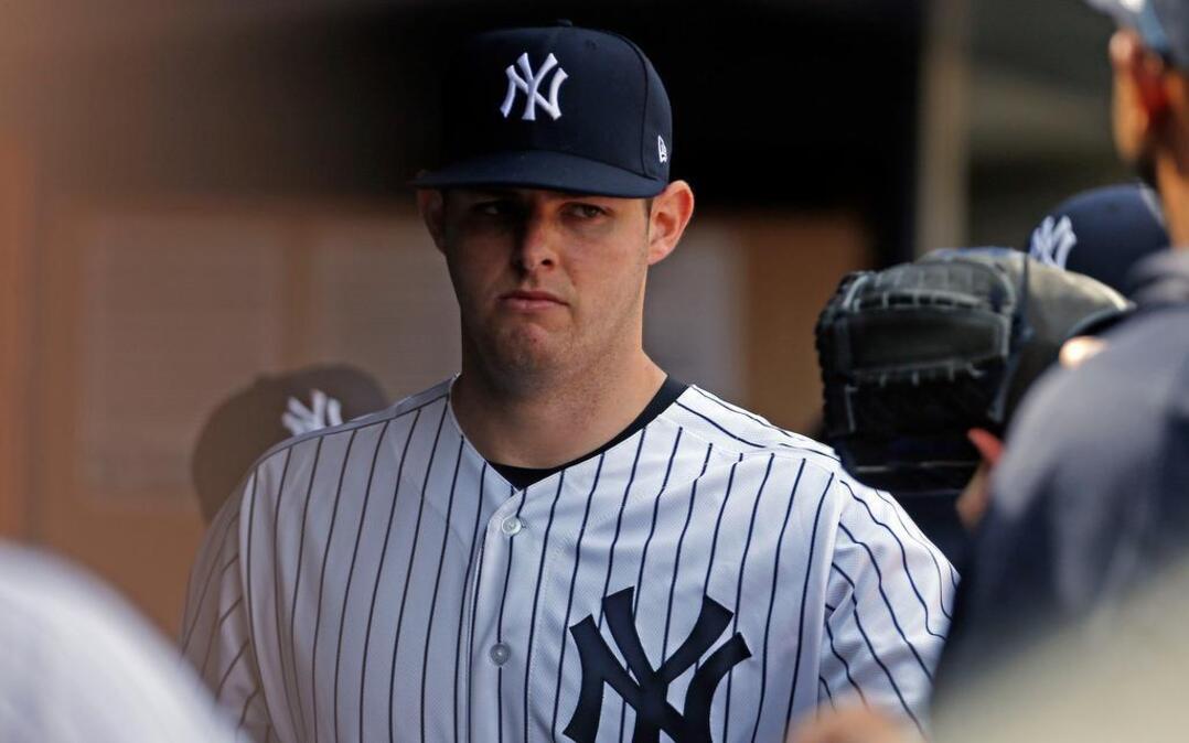 York Yankees starting pitcher Jordan Montgomery reacts in the dugout after being removed from the game against the Tampa Bay Rays.