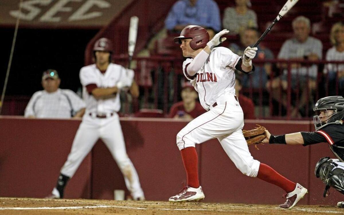South Carolina's Marcus Mooney connects for a base hit against Davidson at Founders Park in Columbia on Wednesday.