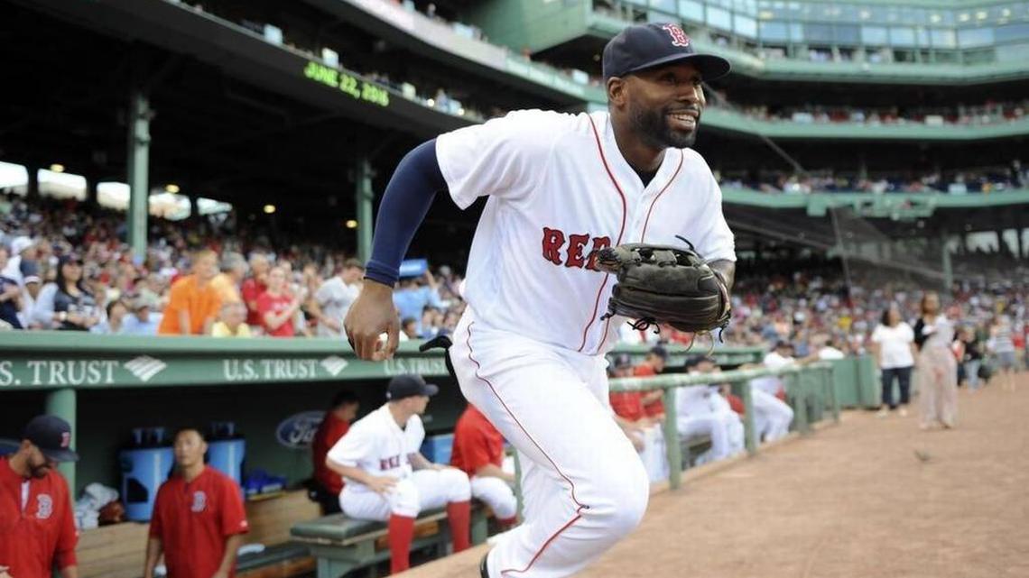 Boston Red Sox center fielder Jackie Bradley Jr. takes the field before a game against the Chicago White Sox at Fenway Park.