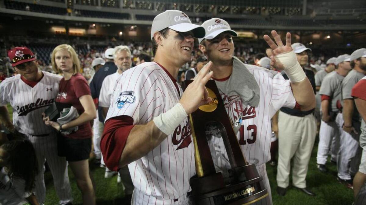 Evan Marzilli and Christian Walker celebrate after South Carolina’s national title in 2011.