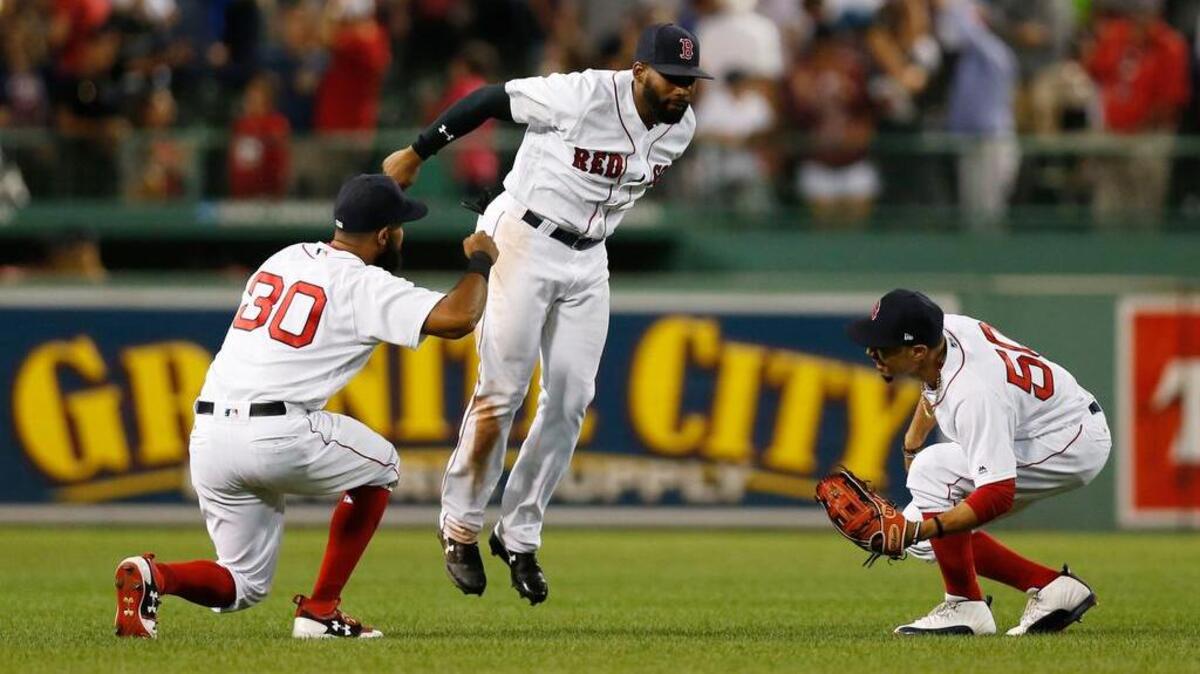 Jackie Bradley Jr., center, continues to play well defensively for the Red Sox.