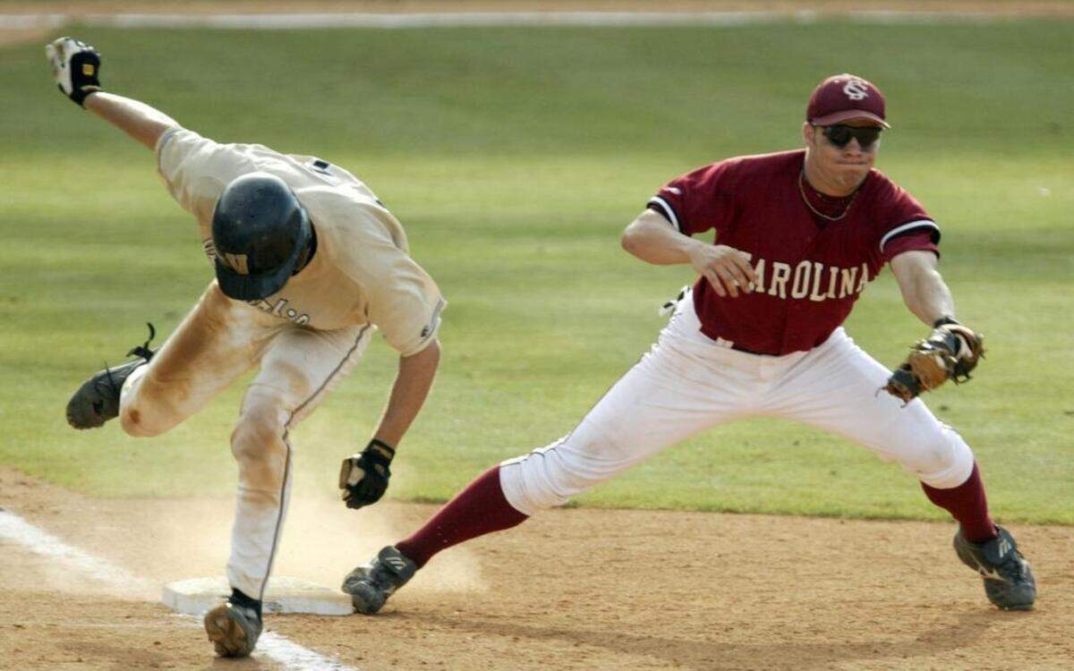 South Carolina alum Steve Pearce, right, signed with the Blue Jays.