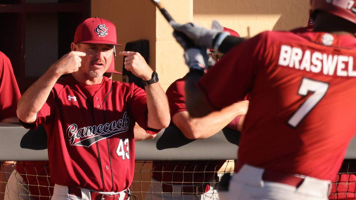 USC Associate Head Coach Monte Lee instructs Michael Braswell Wednesday during the Gamecocks’ game against the Winthrop Eagles in Rock Hill, S.C.