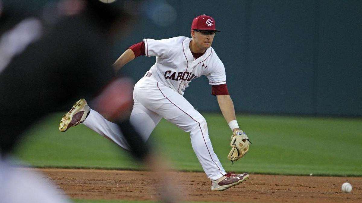 South Carolina's Jonah Bride makes a play at third as the Gamecocks take on Davidson at Founders Park in Columbia, SC, Wednesday, March 16, 2016.