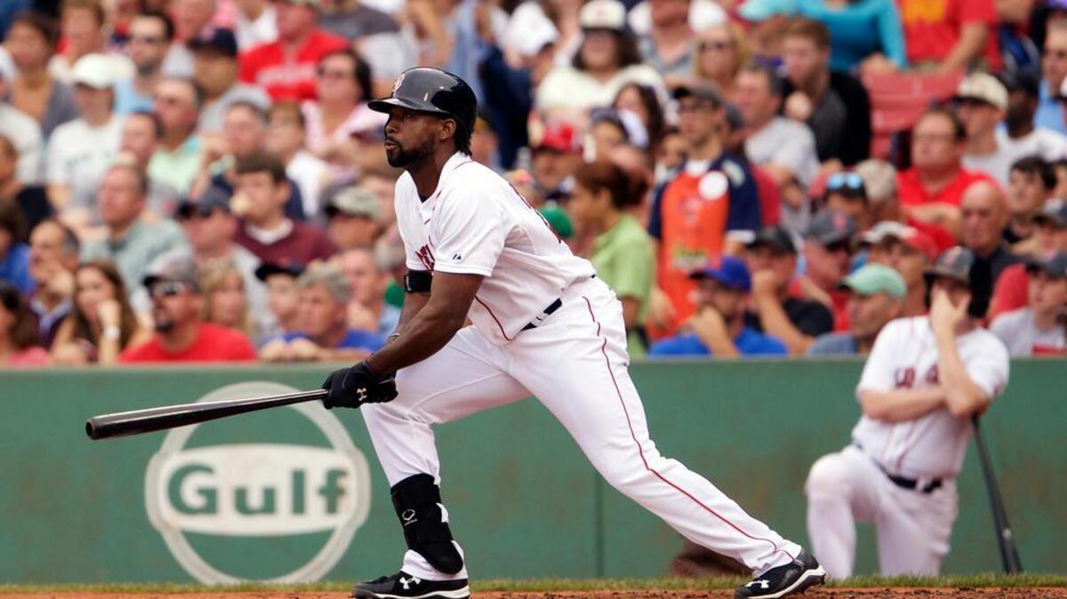
Boston Red Sox center fielder Jackie Bradley Jr. (25) hits a double and drives in a run against the Kansas City Royals
