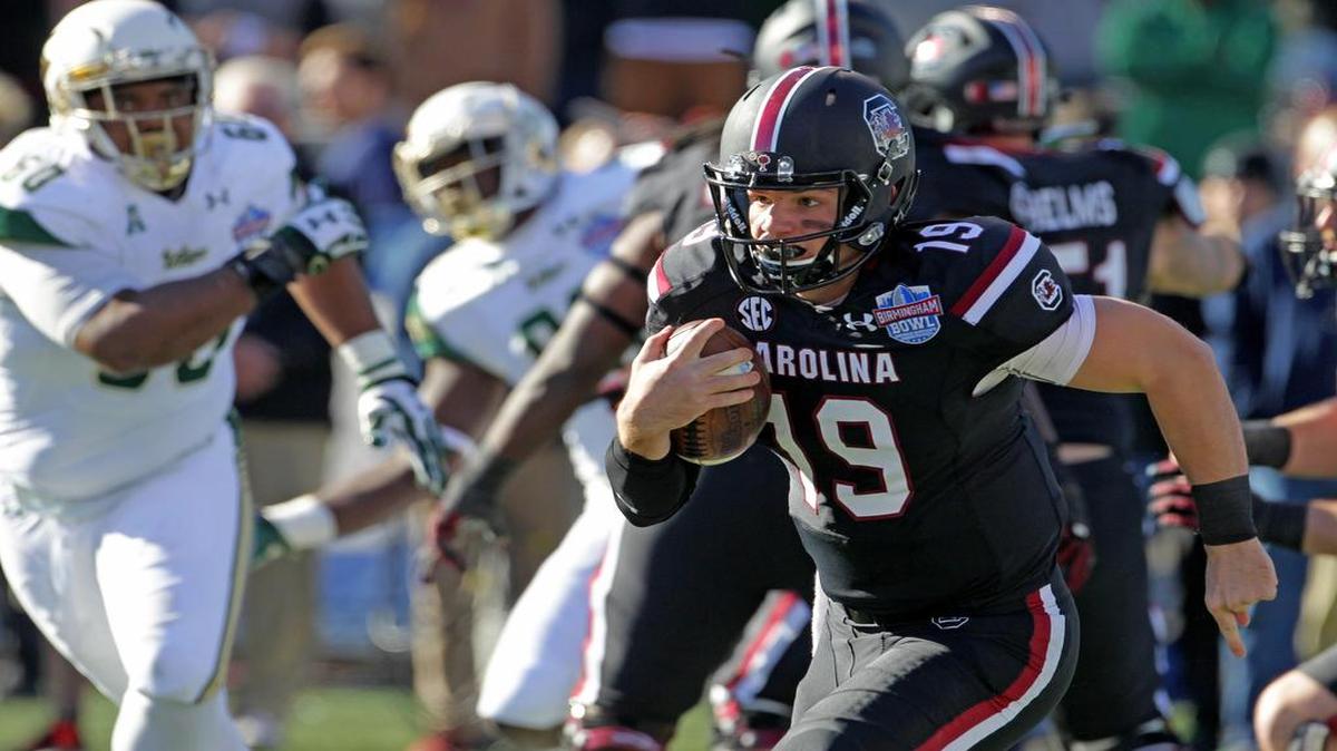 South Carolina Gamecocks quarterback Jake Bentley (19) breaks free for first down on a keeper in the first half of the Birmingham Bowl