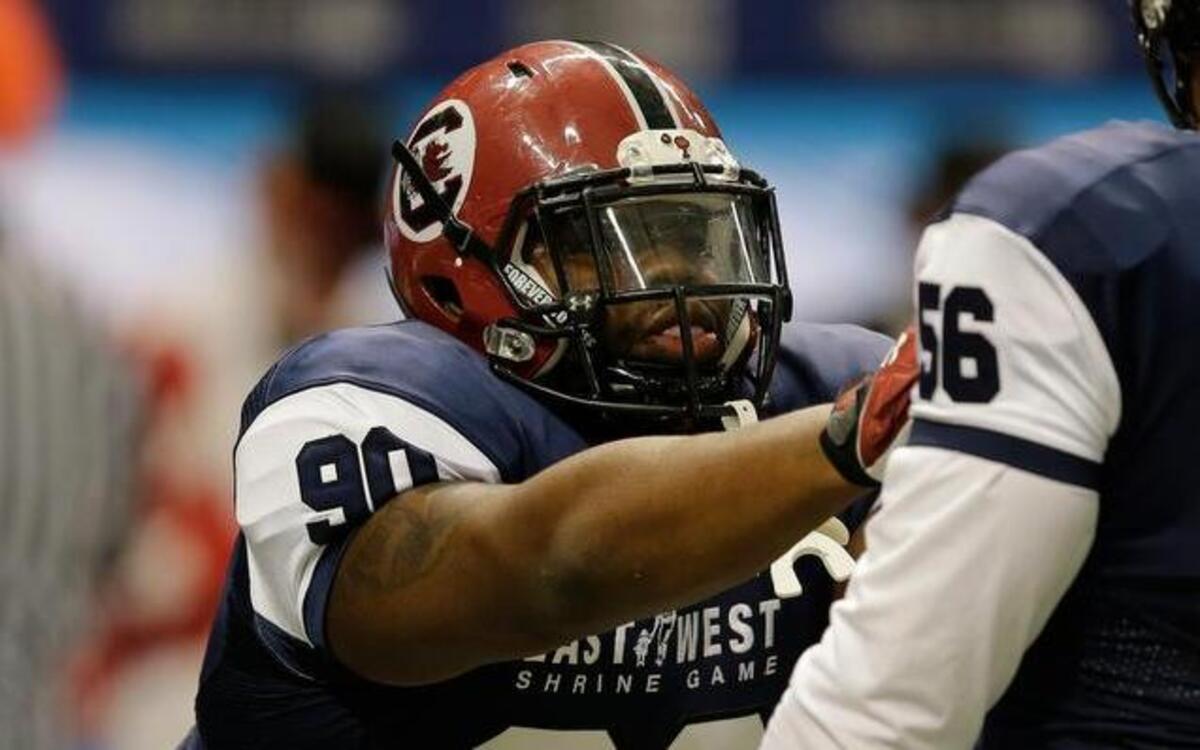 Defensive tackle Gerald Dixon Jr. (90) of South Carolina at the East West Shrine football game.