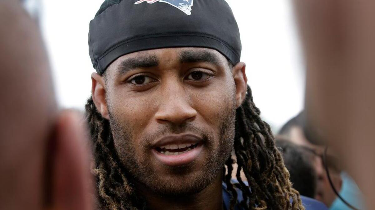 New England Patriots cornerback Stephon Gilmore, a former South Carolina player, speaks with reporters at NFL football training camp in Foxborough, Mass. (AP Photo/Steven Senne)