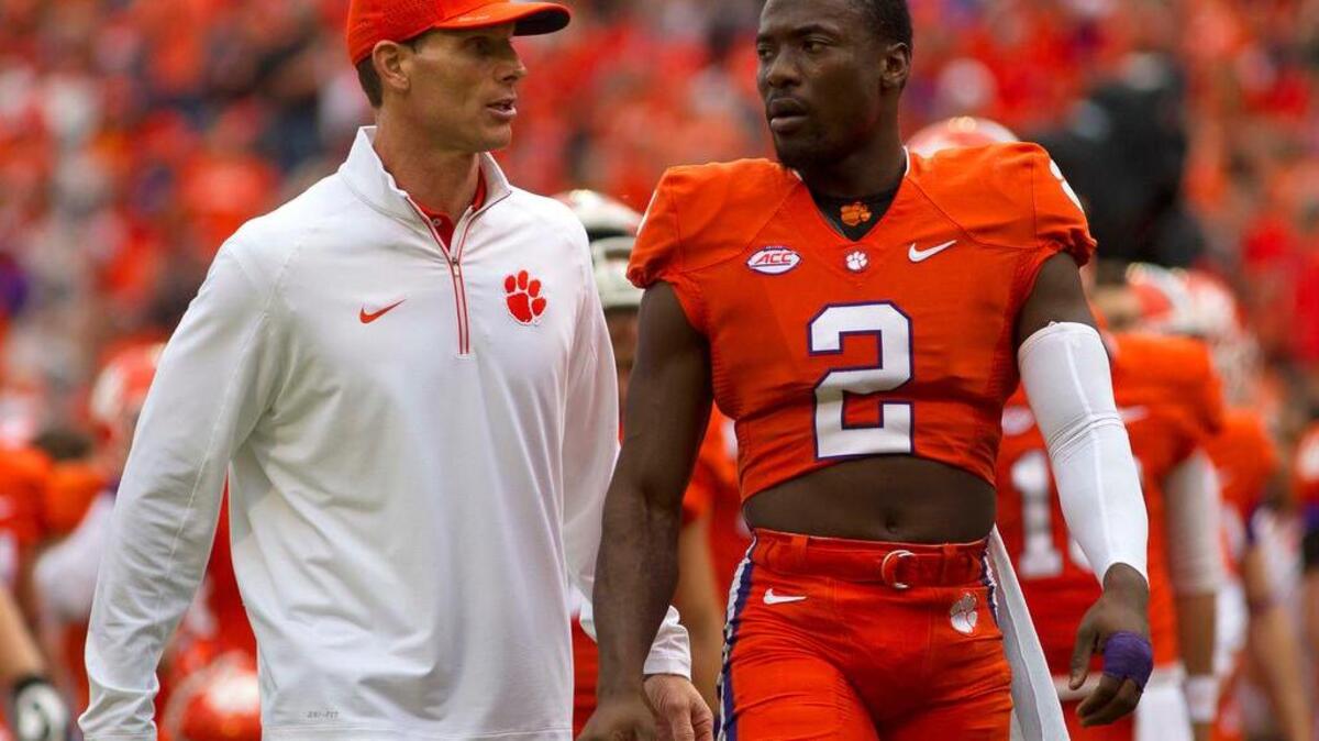Clemson Tigers defensive coordinator Brent Venables talks cornerback Mackensie Alexander (2) prior to the game against Florida State.
