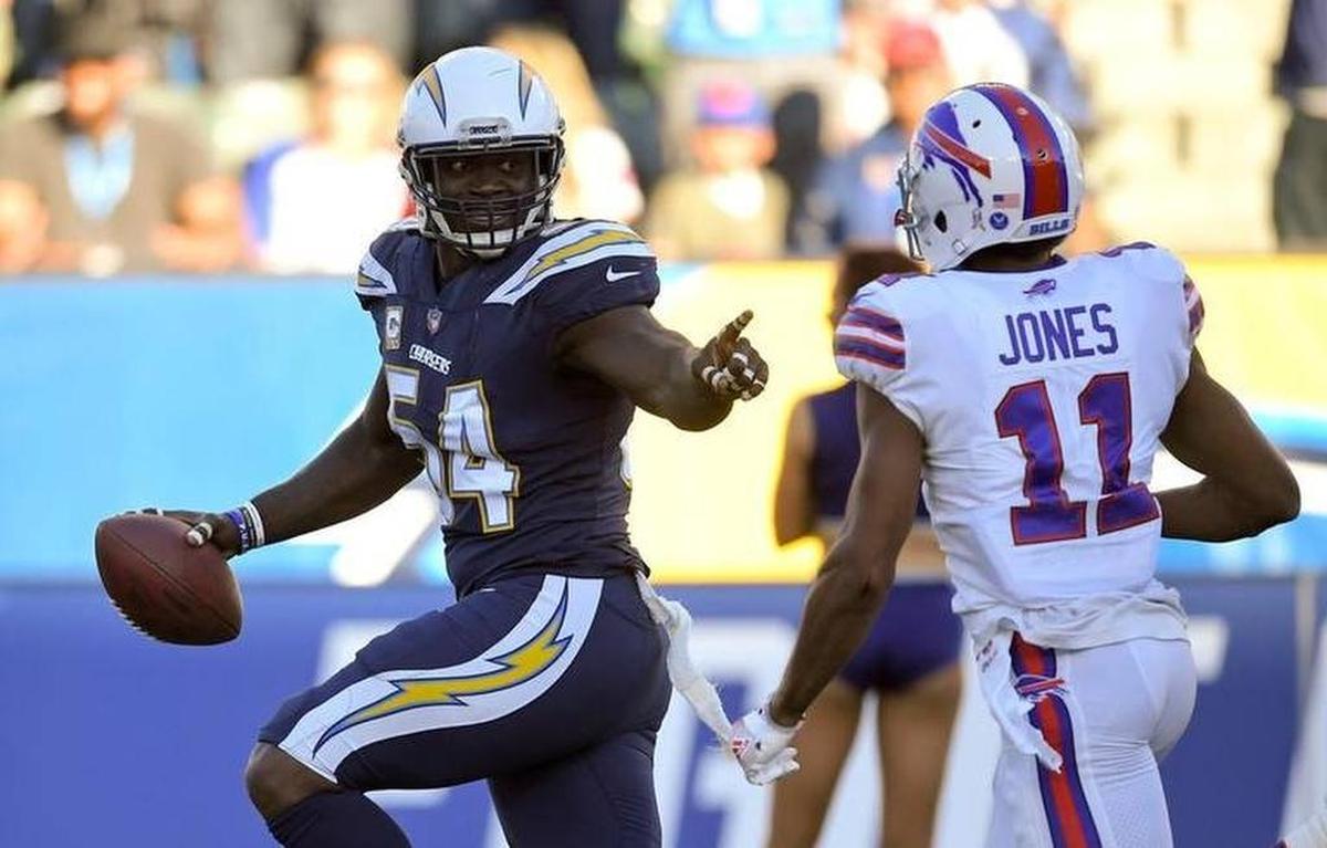 Los Angeles Chargers outside linebacker Melvin Ingram, left, scores past Buffalo Bills wide receiver Zay Jones during the second half of an NFL football game, Sunday, Nov. 19, 2017, in Carson, Calif.