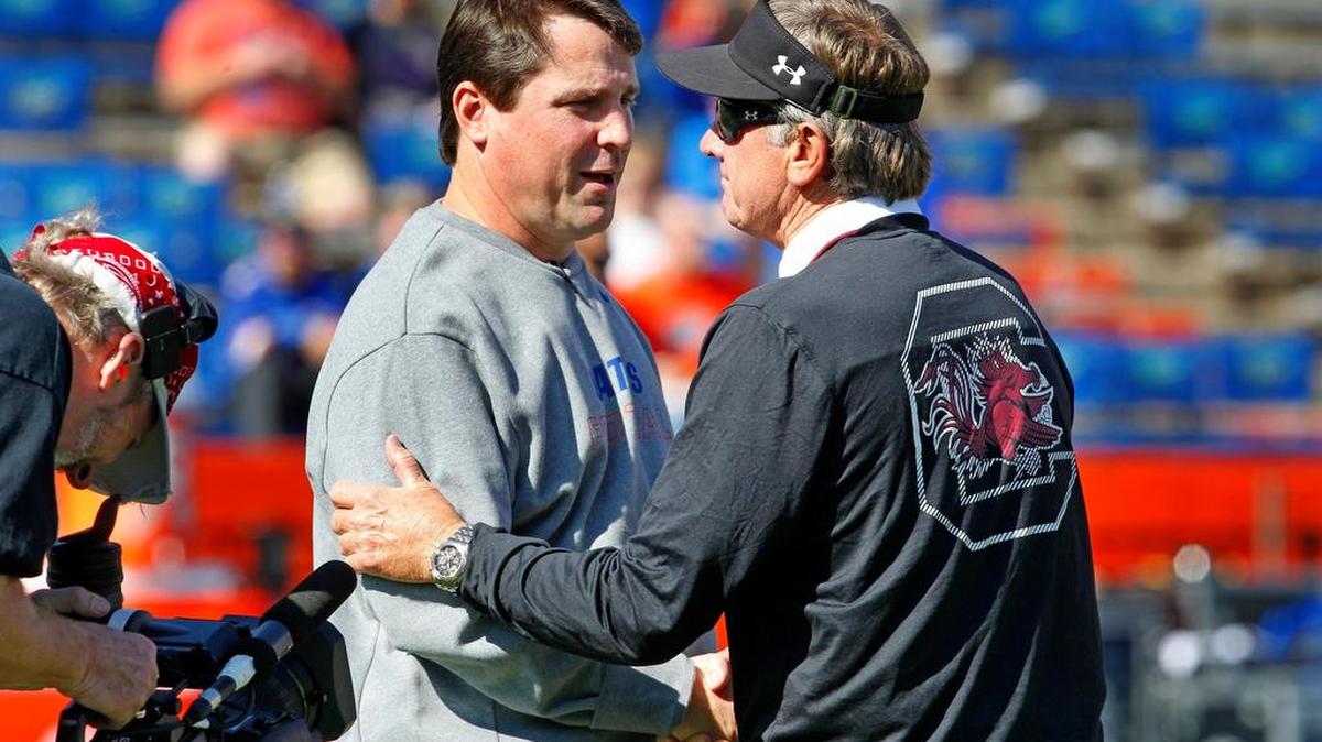 New South Carolina head coach Will Muschamp and former head coach Steve Spurrier