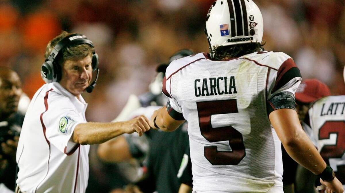 
From 2010: Steve Spurrier and Stephen Garcia celebrate a touchdown.
