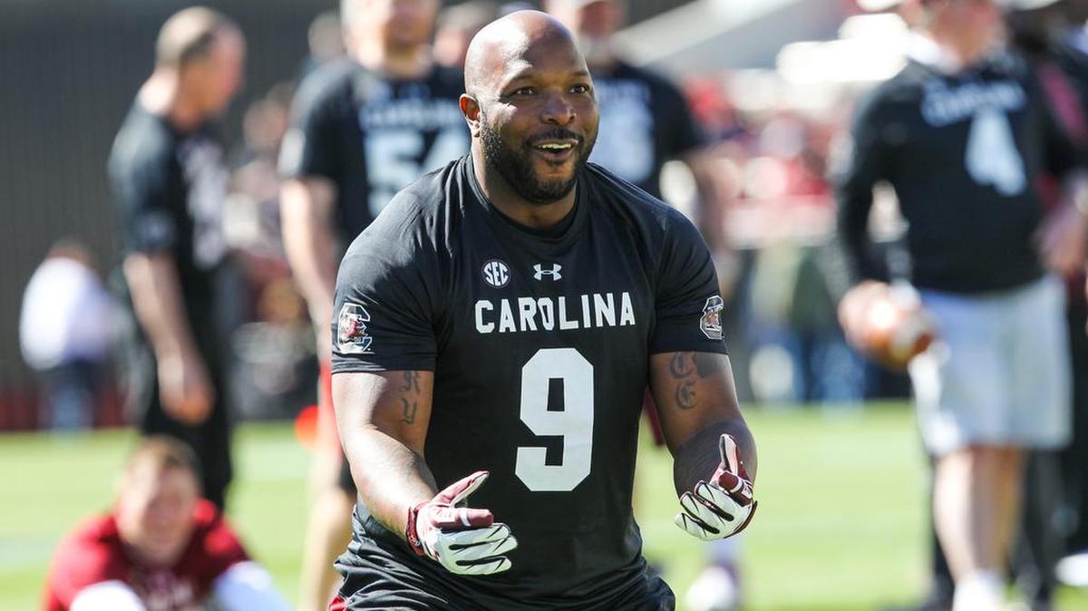 Corey Jenkins warms up before the South Carolina Alumni flag football game at William’s-Brice stadium.