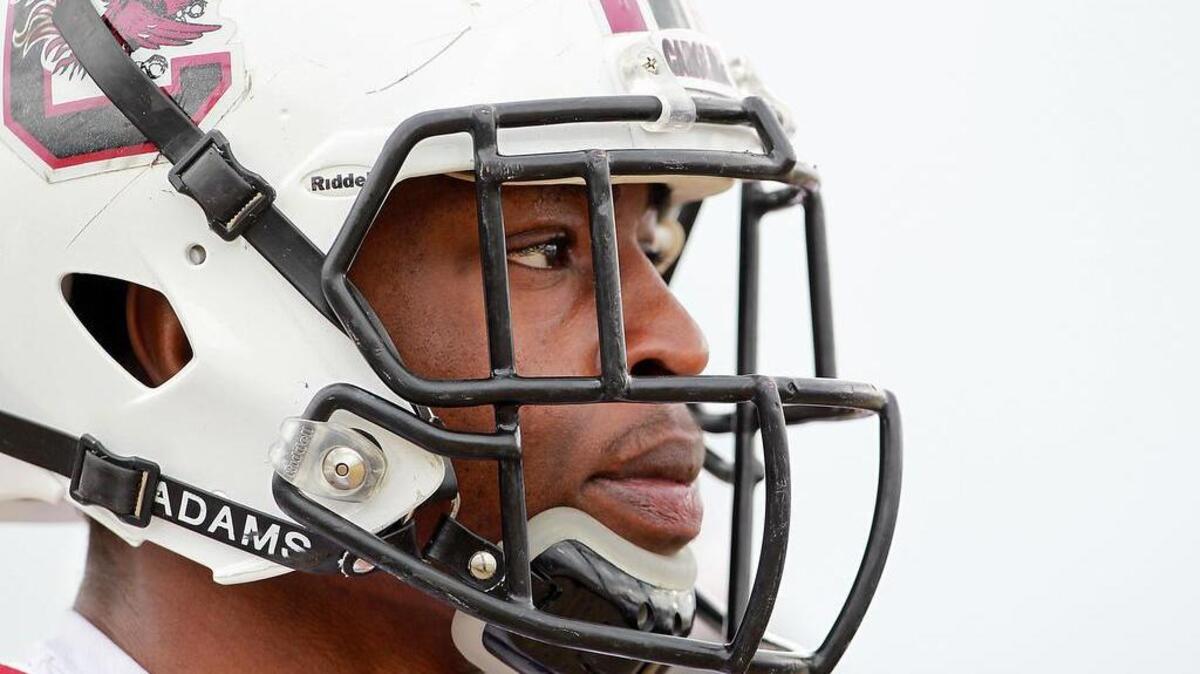 
USC's Darius English runs through drills during practice.
