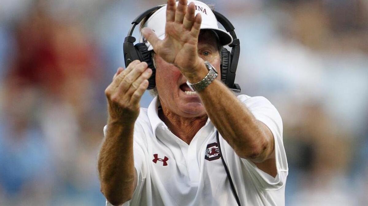 
South Carolina coach Steve Spurrier calls a timeout against North Carolina last week. Spurrier and the Gamecocks face Kentucky on Saturday, a team they lost to last year on the road.
