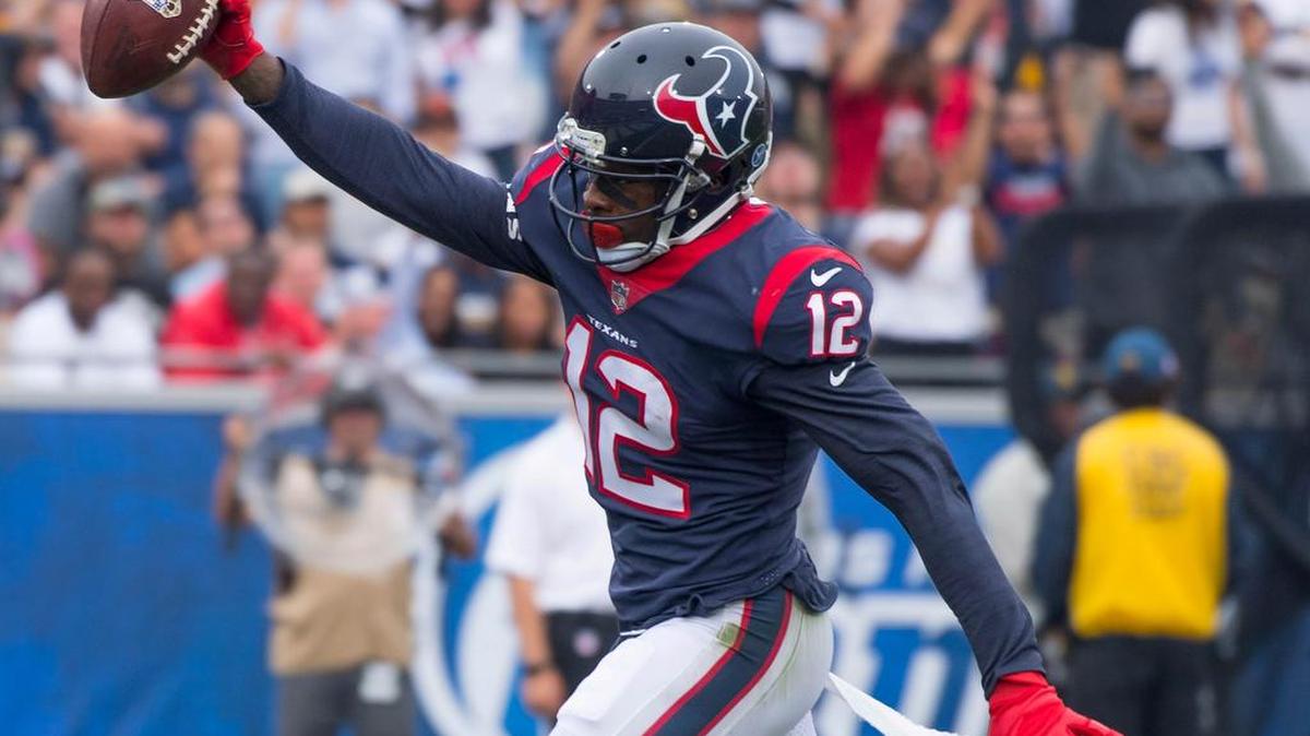 Houston Texans wide receiver Bruce Ellington (12) sprints to the end zone to score a 26 yard touchdown on a pass from Houston Texans quarterback Tom Savage (3) during the second quarter against the Los Angeles Rams at Los Angeles Memorial Coliseum.