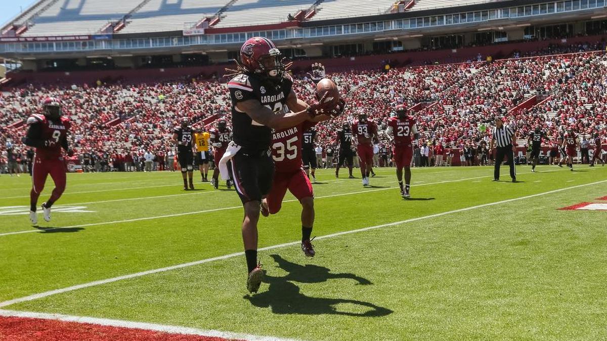 South Carolina wide receiver Christian Owens (23) catches a touchdown pass during the Garnet and Black Spring Game at Williams-Brice Stadium.