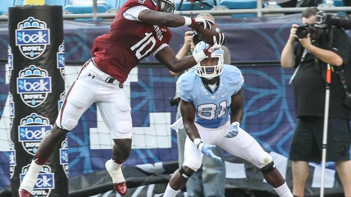 
South Carolina's Skai Moore catches an interception during the first quarter of Thursday's game against UNC.
