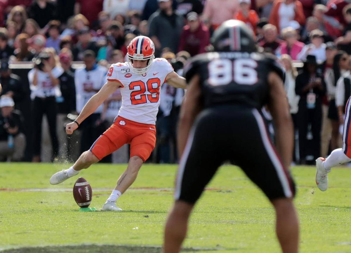 Clemson’s B.T. Potter kicks the ball Saturday at the Clemson v. South Carolina game in Columbia.