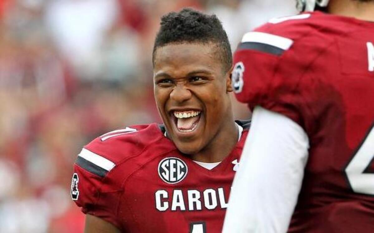 
South Carolina Gamecocks wide receiver Pharoh Cooper (11) starts celebrating with teammates as time winds down in the fourth quarter against UCF.
