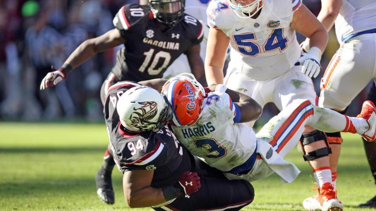 South Carolina defensive tackle Kelsey Griffin sacks Florida quarterback Treon Harris last season.