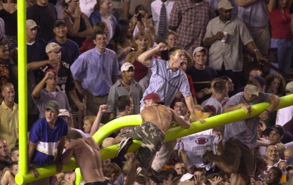 Fans storm the goal posts following the 2000 win over New Mexico State.
