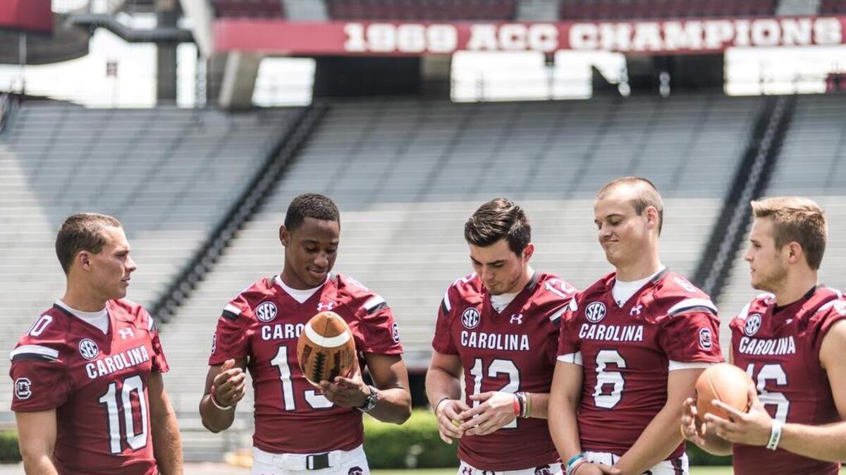 
USC quarterbacks Perry Orth), Lorenzo Nunez, Michael Scarnecchia, Connor Mitch and Gage Pucci.
